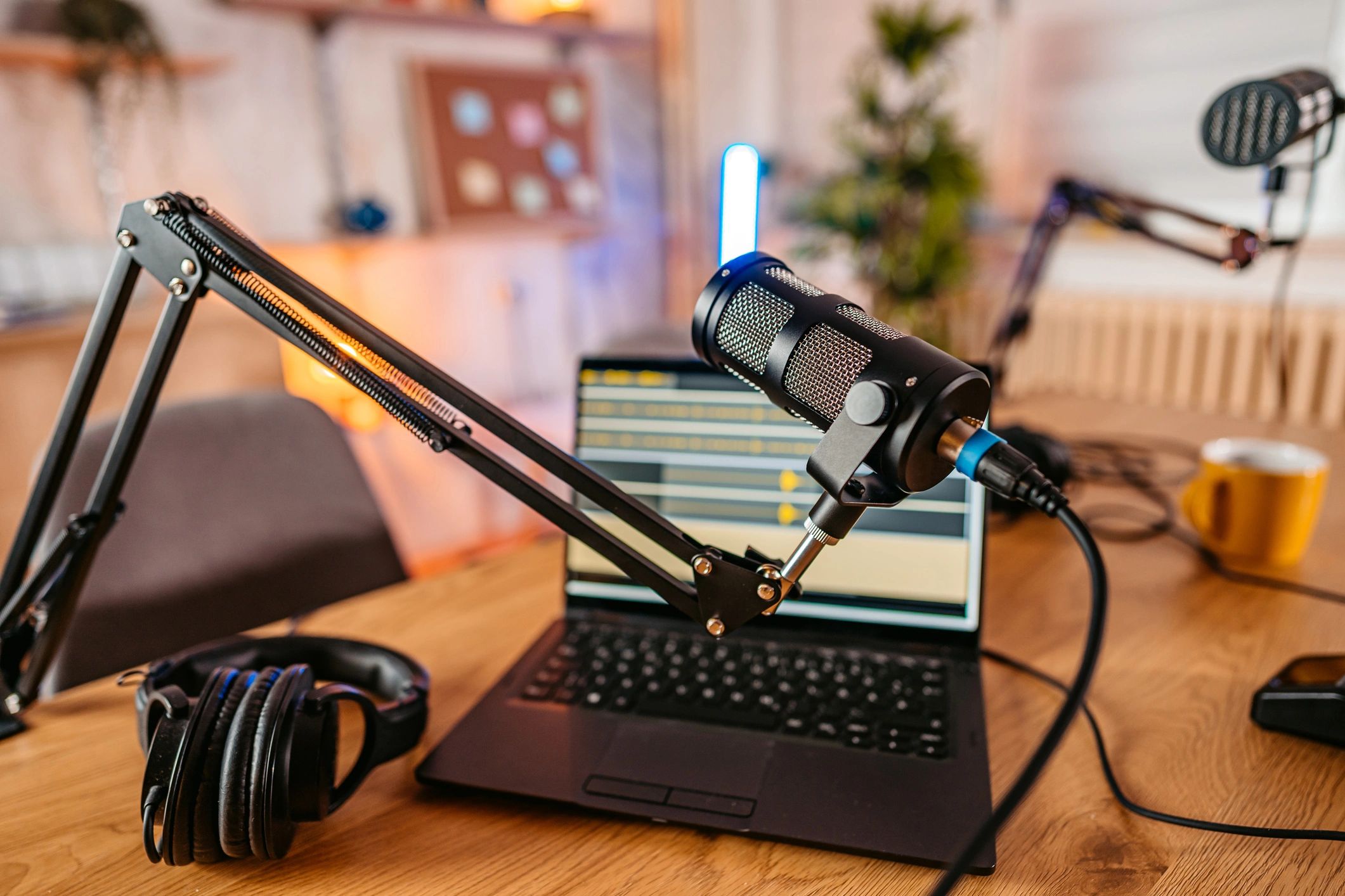 Studio microphone with laptop in background