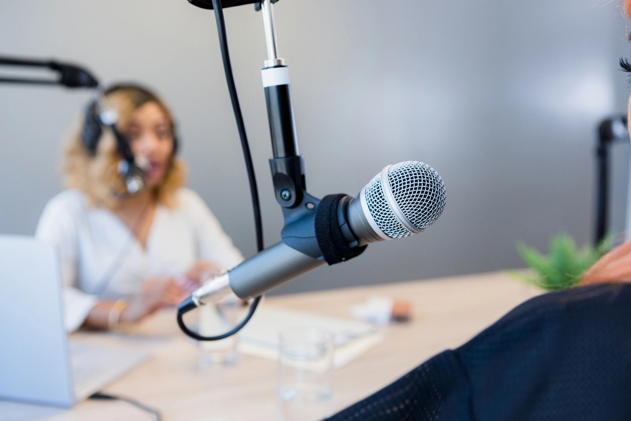 Microphone in focus during a podcast interview