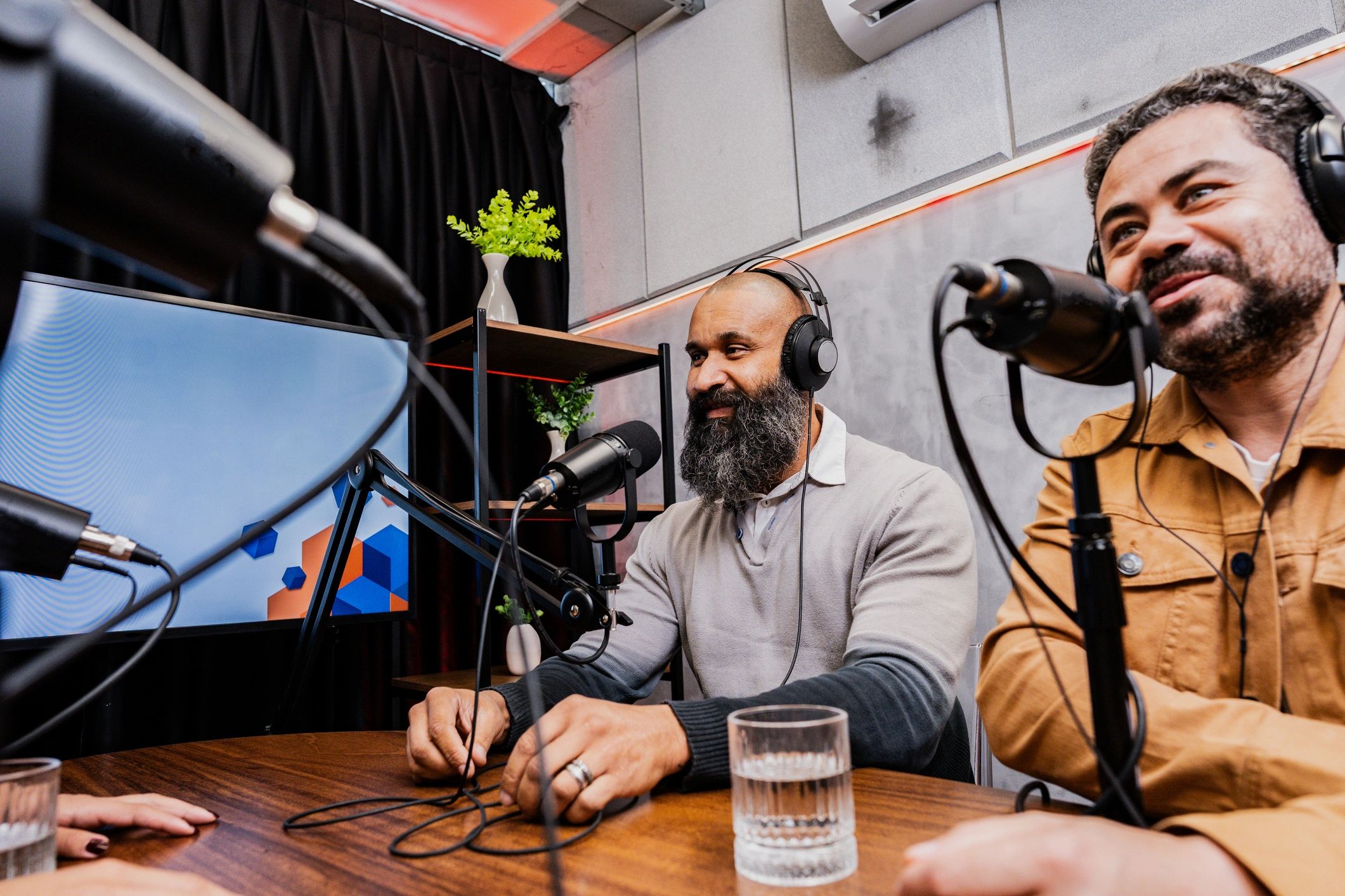 Guests talking in a recording studio